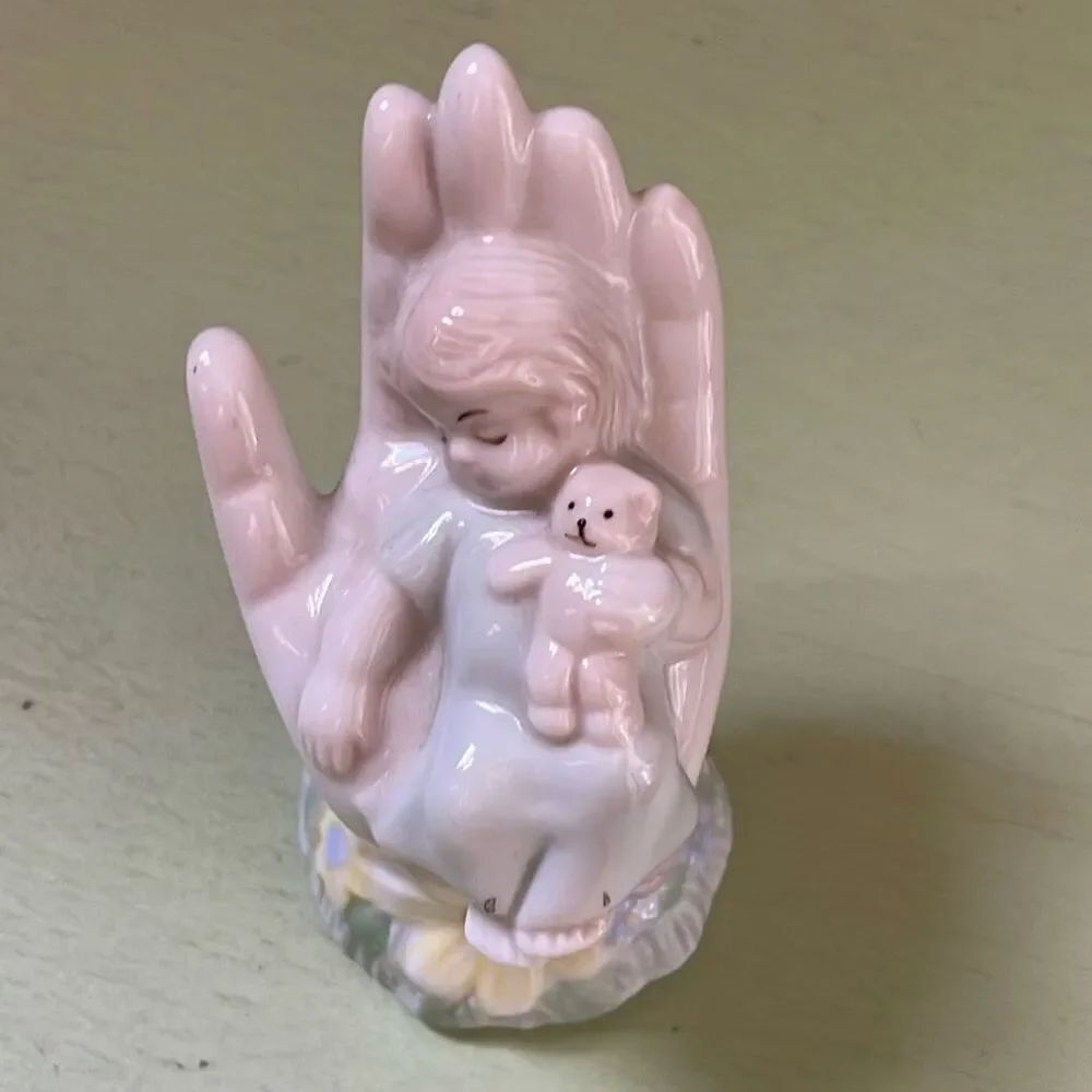 Vintage porcelain “ In God’s Hand “ child and toy figurine
